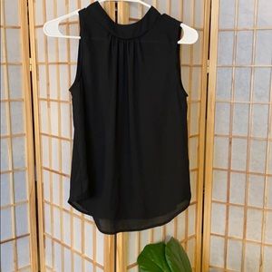 Black sleeveless blouse